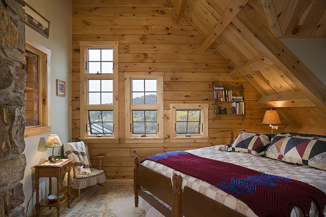 Interior, horizontal, second level guest room with square windows looking out to mountains, Hofmann residence, Pike, New Hampshire, Coventry Log Homes